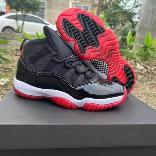Jordan 11 “Bred” (Black/Red)